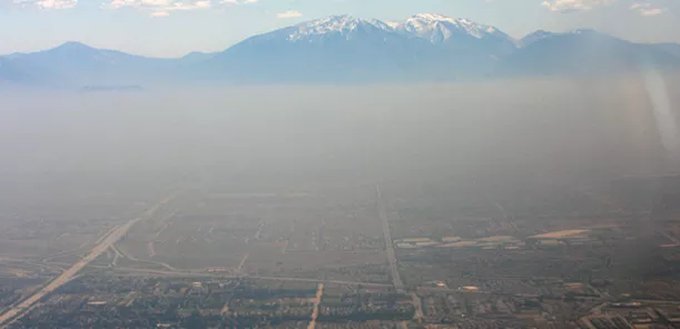 Smog over a deep mountain valley. Credit: NOAA