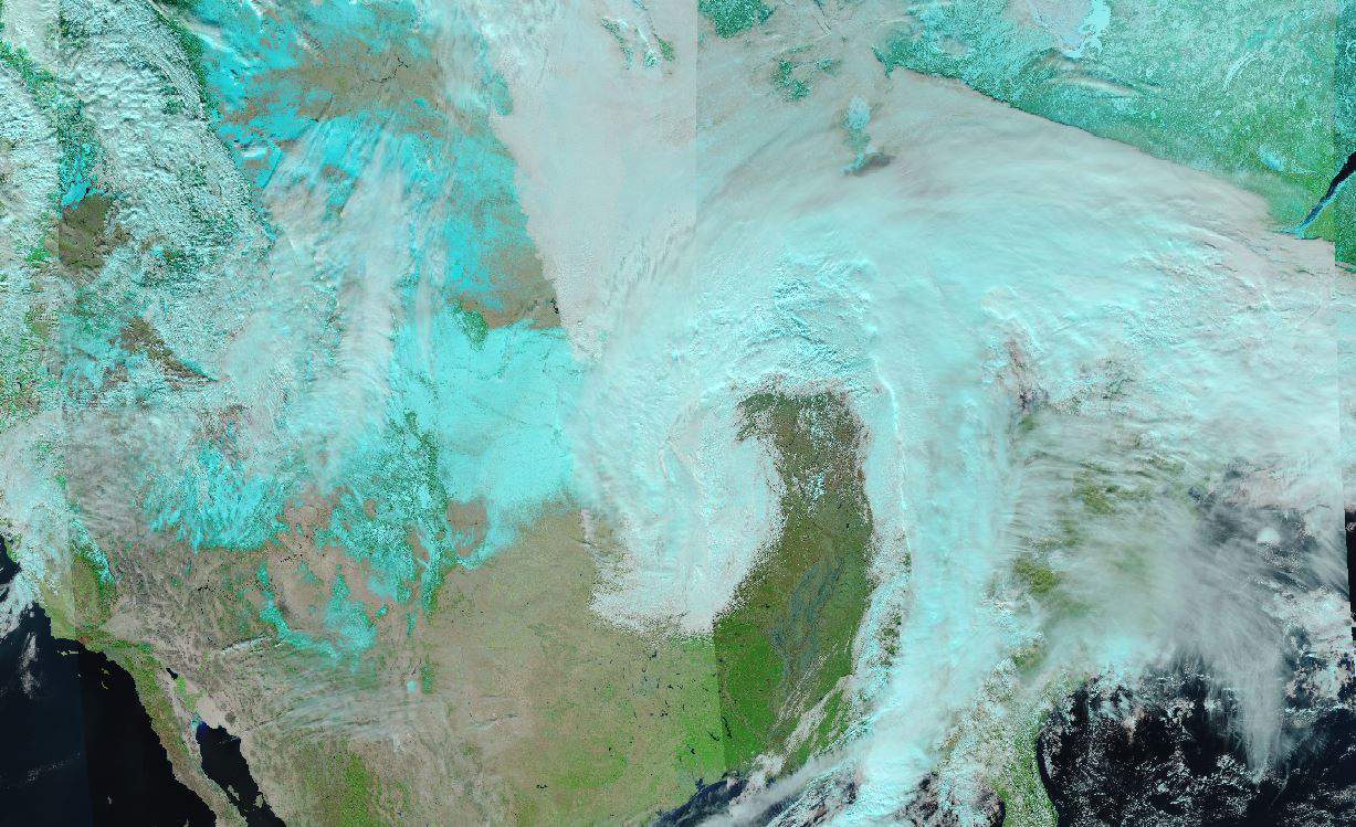 In this true-color image of the MidWest, snow cover is seen in cyan, to differentiate it from cloud cover in white. Snow covers the majority of the northern MidWest, while green and brown land is see in the south.