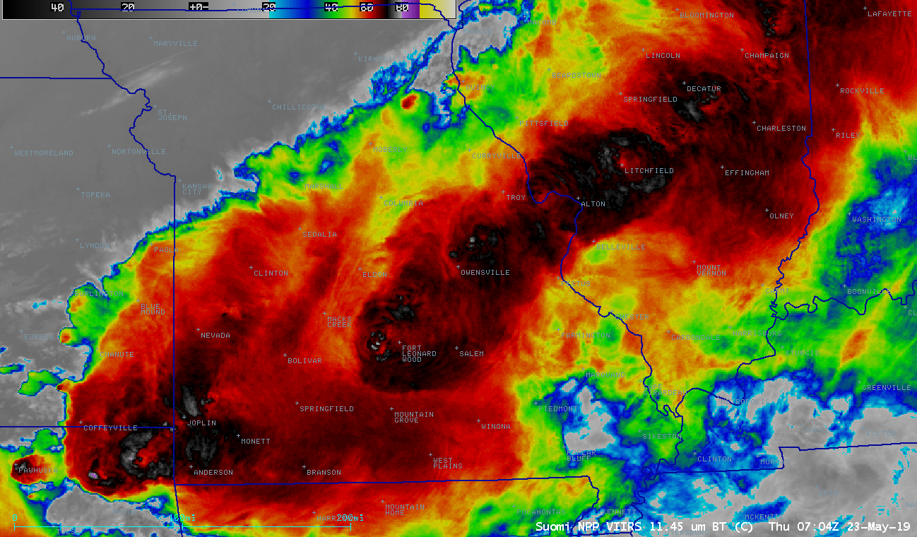 An animation flips between three consecutive views of massive storm clouds covering Missouri. The infrared images show the storms in shades of red, orange, yellow, green and blue, with dark red in the center of the line of clouds indicating the coldest (and highest intensity) areas.