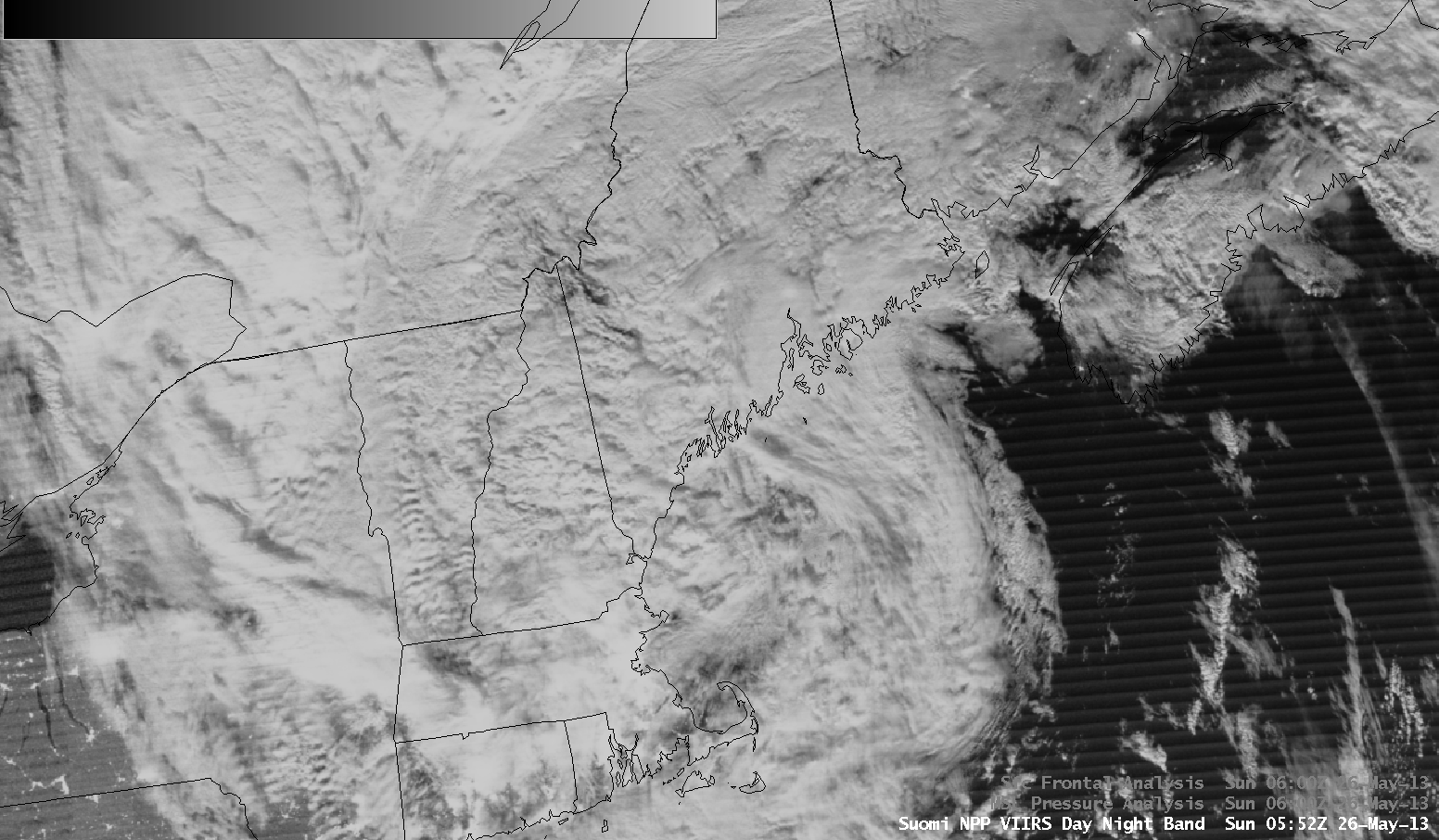 An animation flips between a Day Night Band image of the storm over New England and an infrared image, showing the location of clouds and the intensity of different areas of the storm.