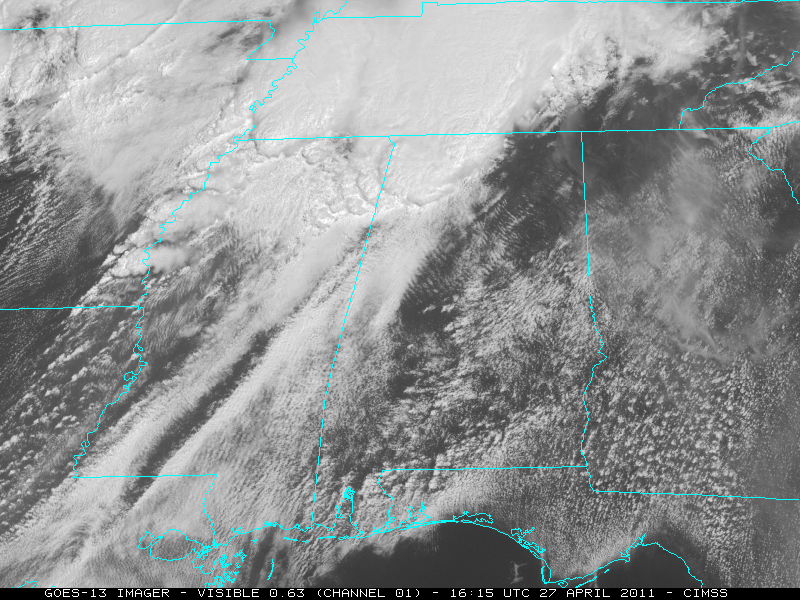 Visible imagery from GOES-13 showing the multiple clusters of severe thunderstorms that developed across the region.