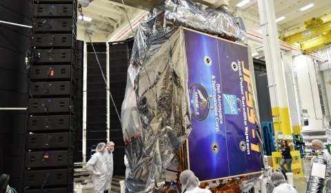 Image of JPSS-1 in the acoustic testing chamber