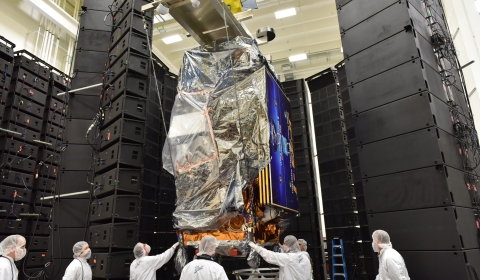 Image of JPSS-1 in acoustic testing chamber