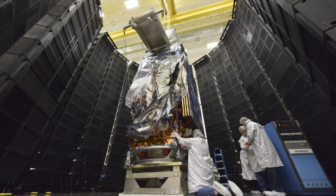 Image of JPSS-1 in acoustic testing chamber