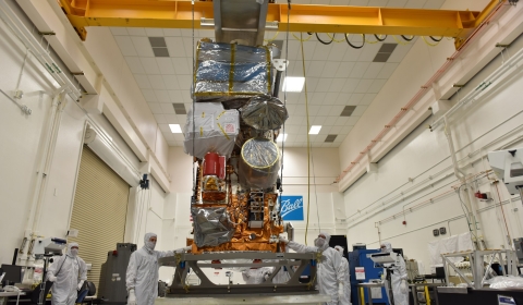 Image of JPSS-1 and ULA Delta II finish fitting check