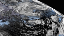 Satellite imagery of low pressure systems swirling over the North Atlantic