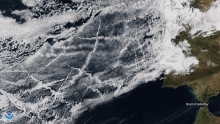 Image of cargo ships just west of the Iberian Peninsula