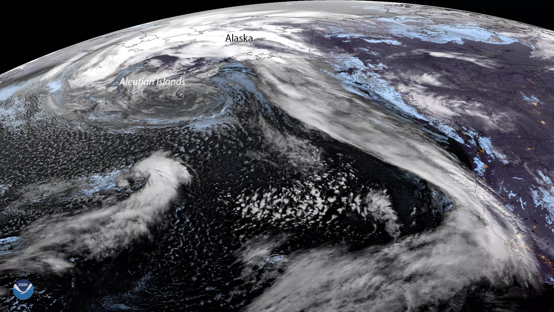 GOES West sees large low pressure system off Alaska. 