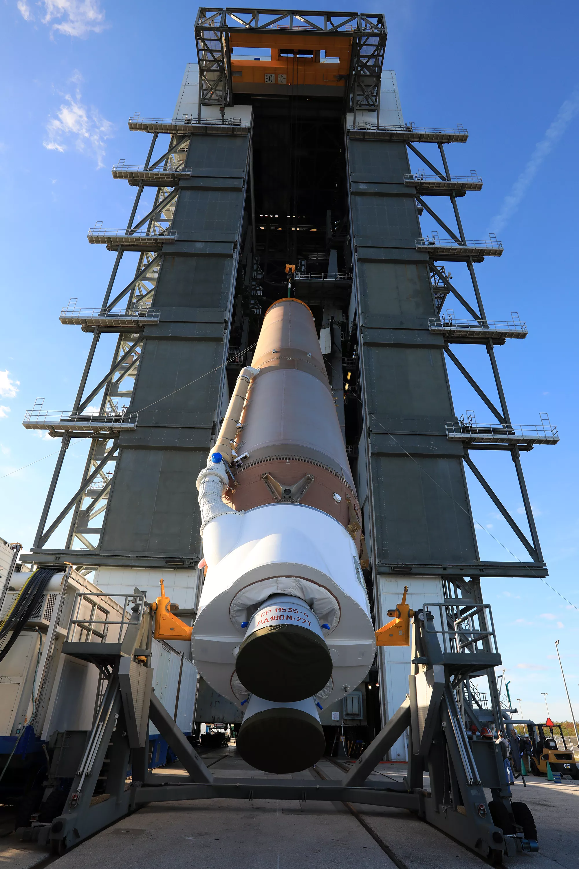 The GOES-R Atlas V first stage lifted to the vertical position at the Vertical Integration Facility.