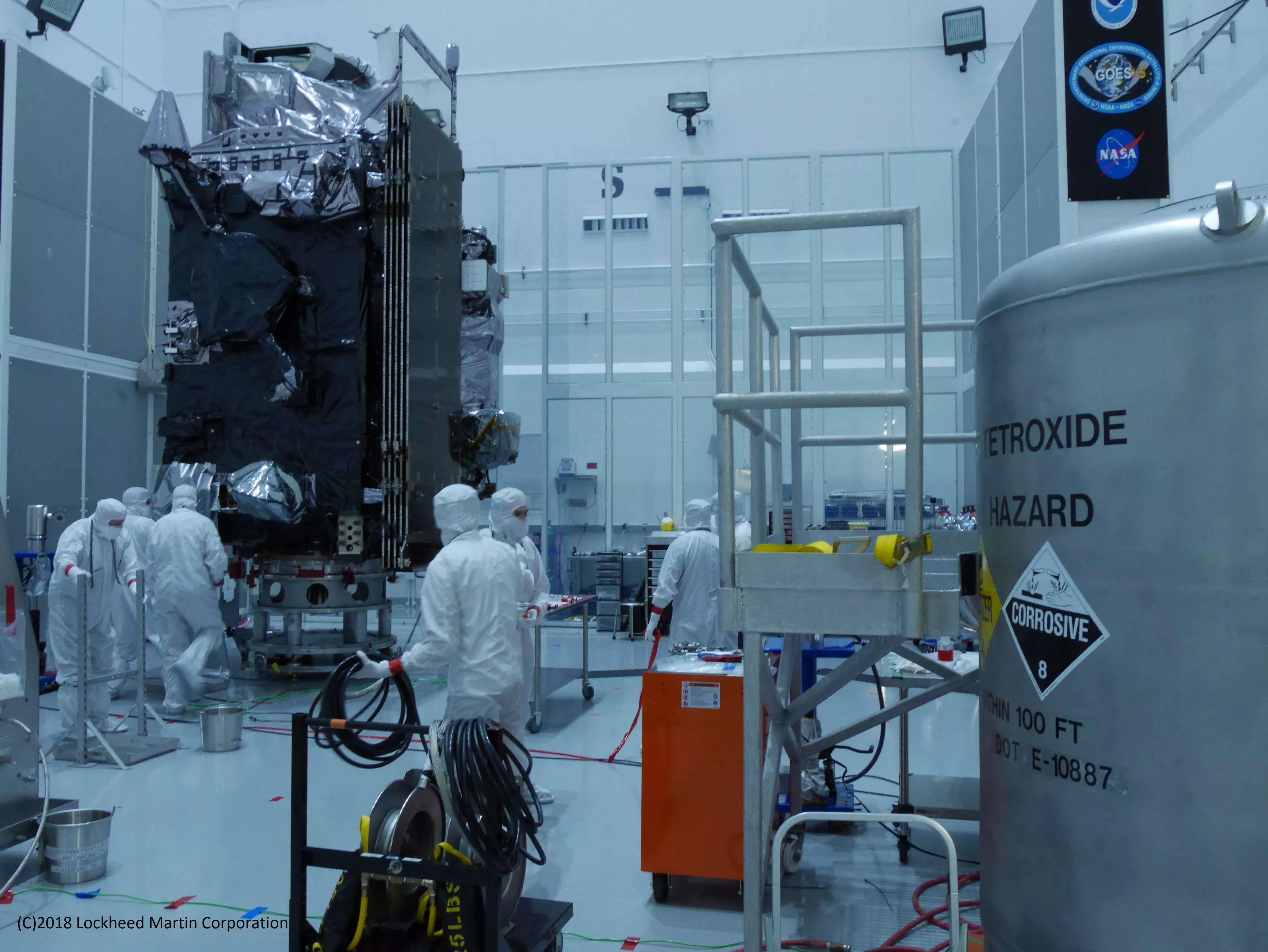 Fueling the GOES-S satellite. Photo credit: Lockheed Martin
