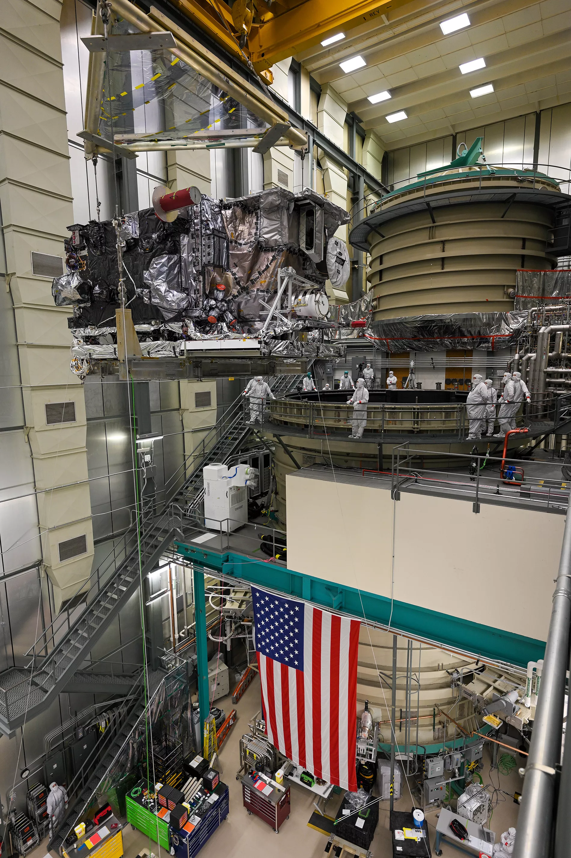 A view of GOES-U about to be lowered into the thermal vacuum chamber.