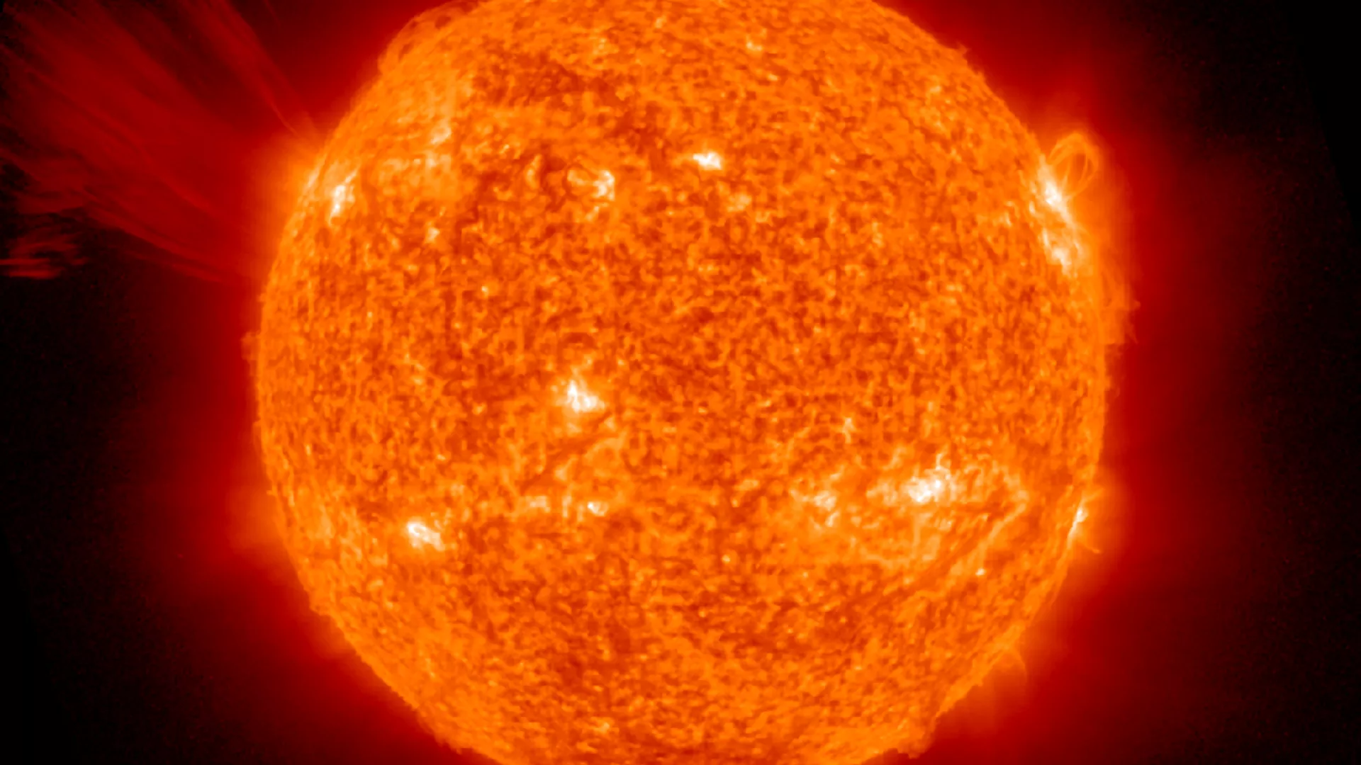 Image of the sun with a solar flare