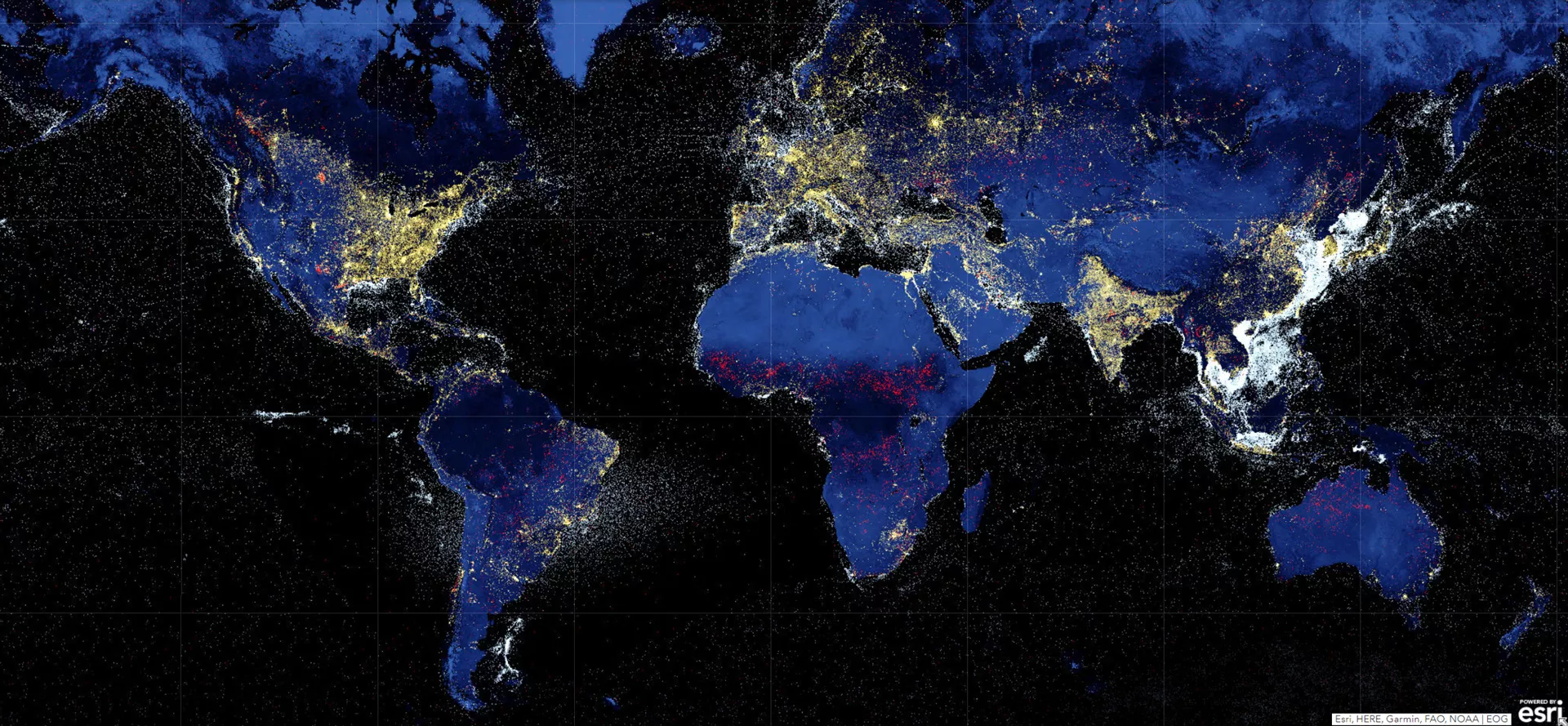 This image is a composite night-time view of the Earth from space, showing various sources of light. The continents are outlined with the lights of cities and towns, and the vast darkness of the oceans contrasts with the illuminated areas. Red dots indicate natural gas flares, gold dots indicate artificial light, and white dots indicate boat detections.