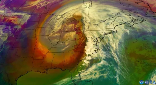 Enhanced color satellite imagery of a severe storm via NOAA's GOES East satellite.