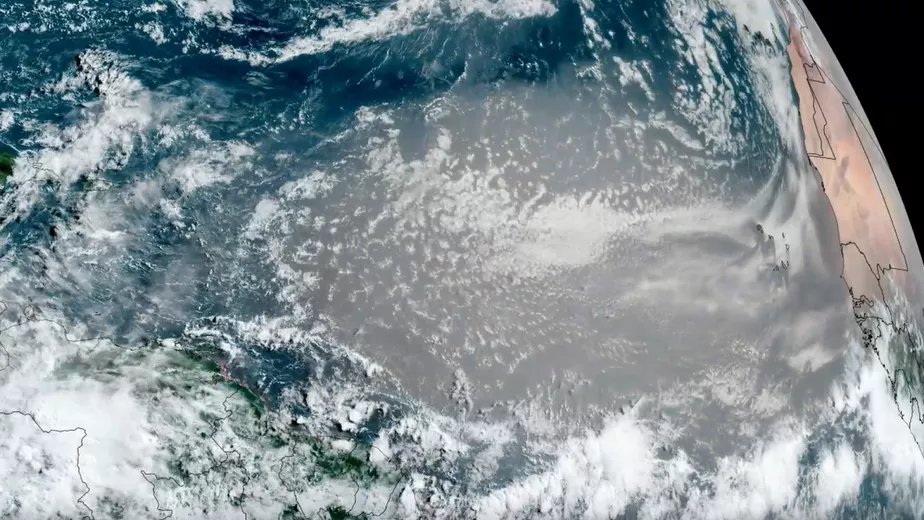 Airborne dust blowing from the Sahara can be seen traveling westward over the Atlantic via NOAA's GOES East (GOES-19) satellite