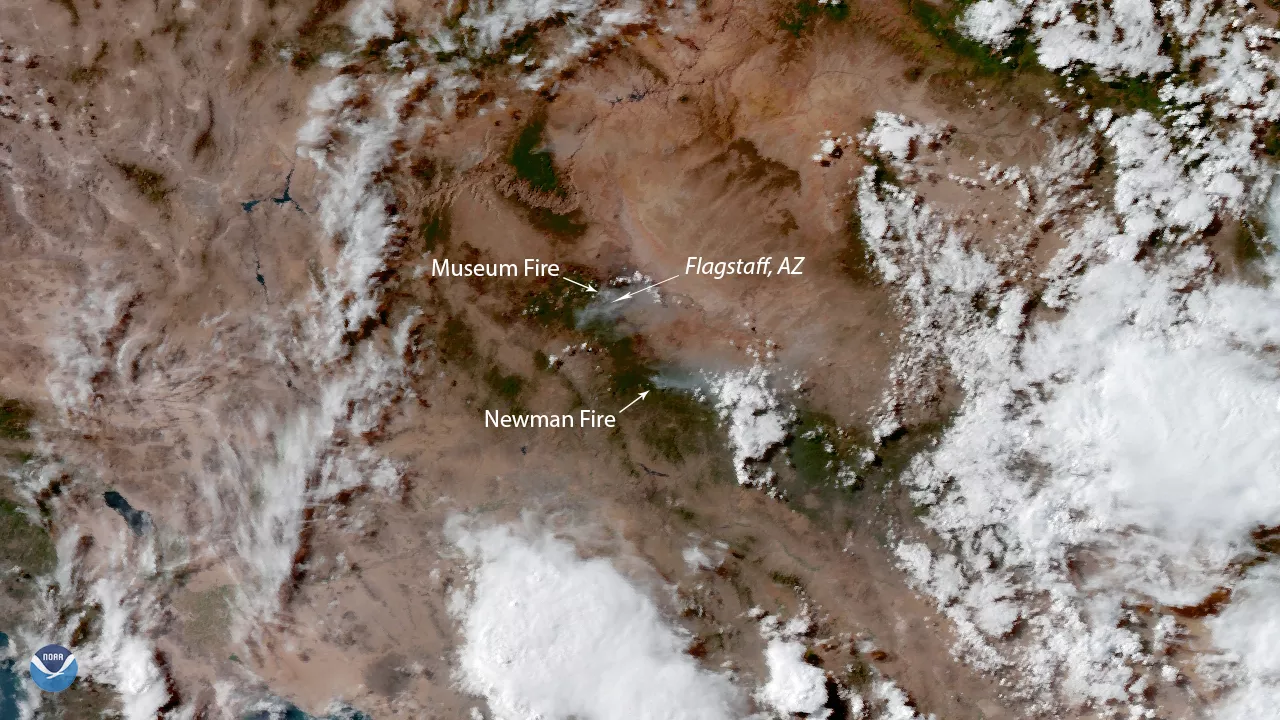 Imagery of the Museum and Newman fires near Flagstaff, Arizona, via GOES West GeoColor imagery. Smoke and clouds are mixed together.