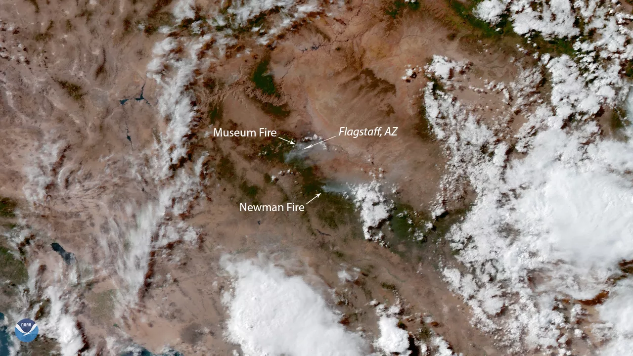 Imagery of the Museum and Newman fires near Flagstaff, Arizona, via GOES West GeoColor imagery. Smoke and clouds are mixed together. 