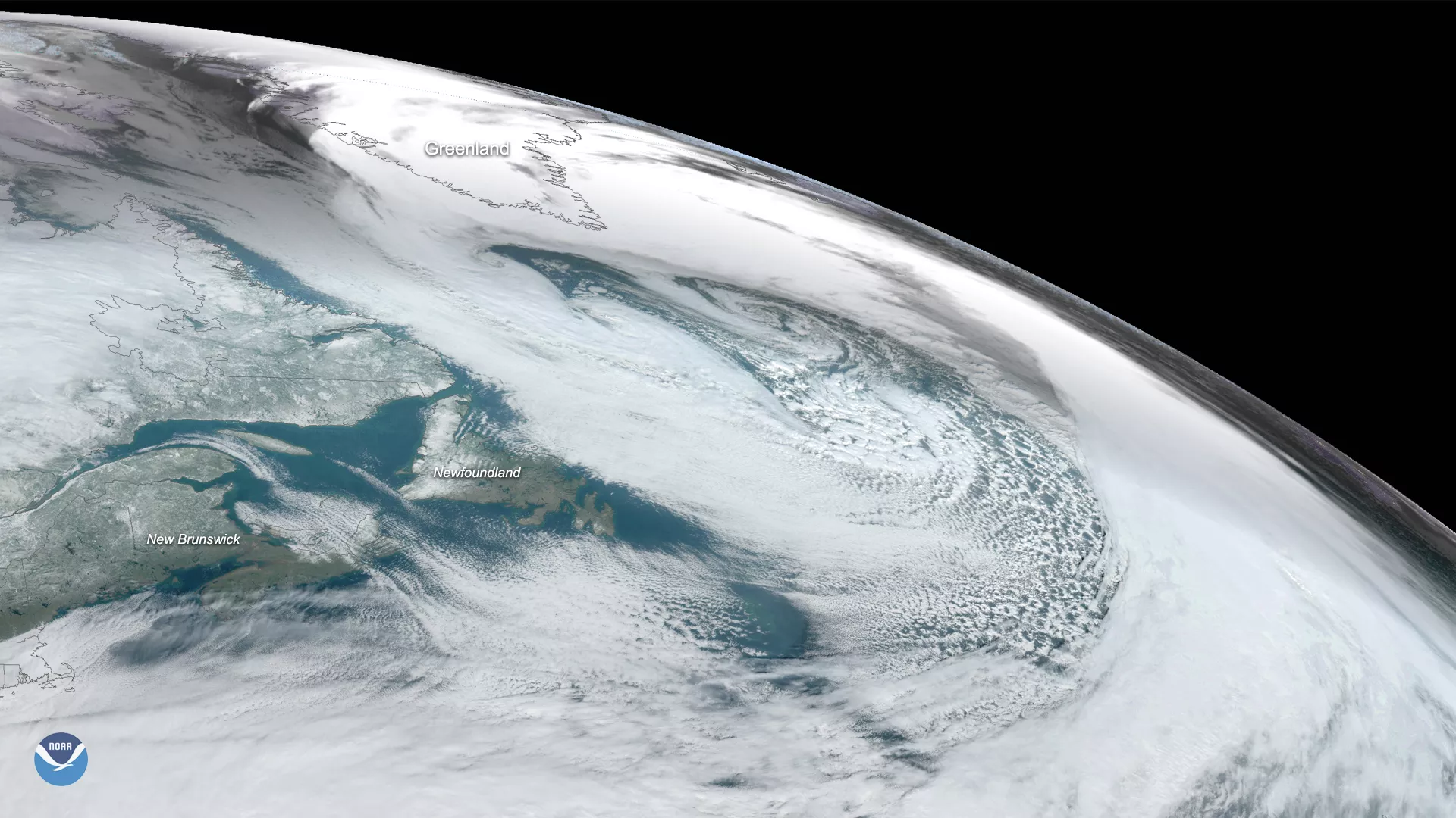 GOES East GeoColor satellite imagery of a massive cyclone over the Labrador Sea between eastern Canada’s Labrador Peninsula and Greenland. 
