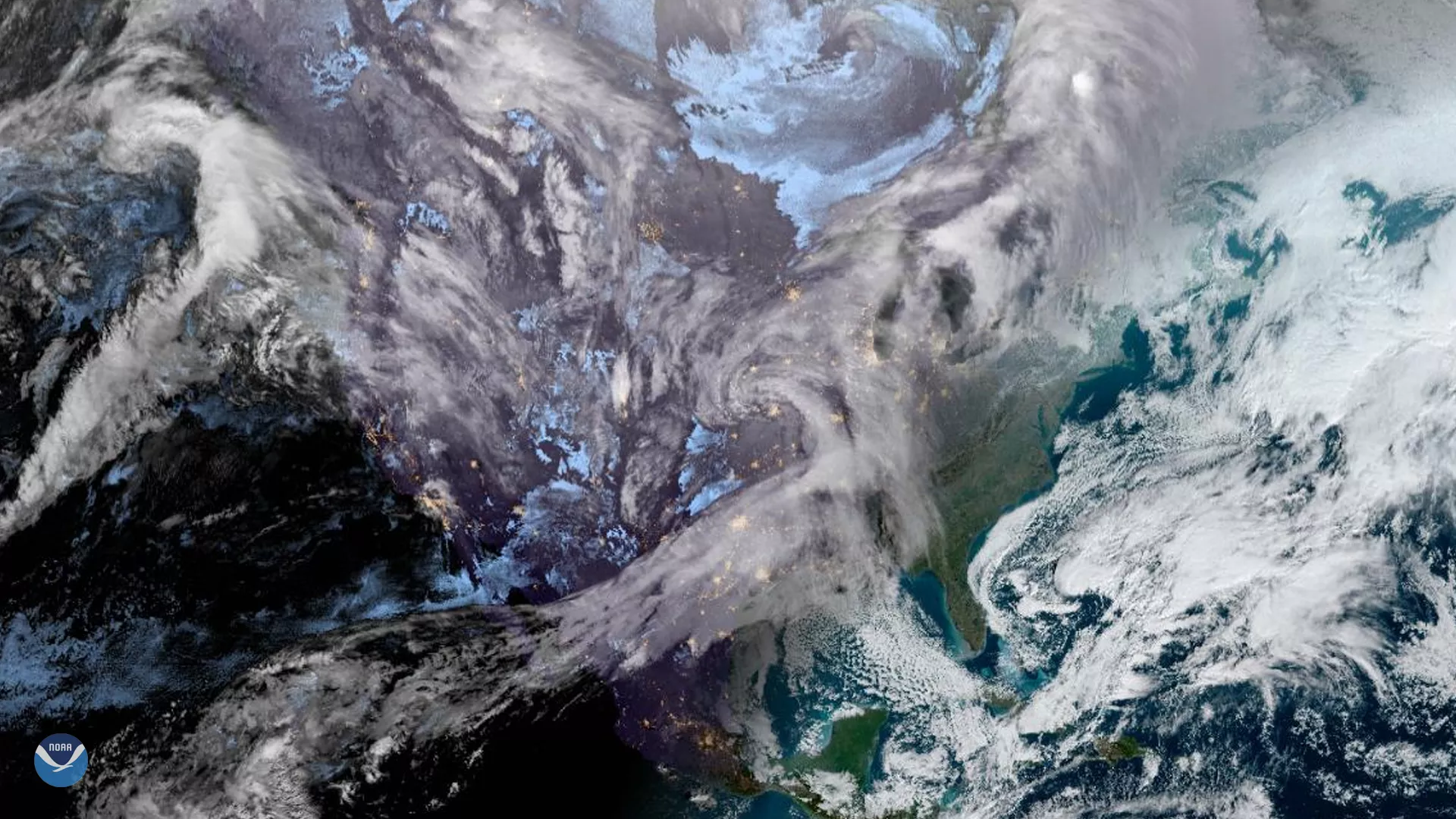 GOES East Geocolor imagery of the United States on Jan. 22, 2020. Seen here are two large winter storm systems.
