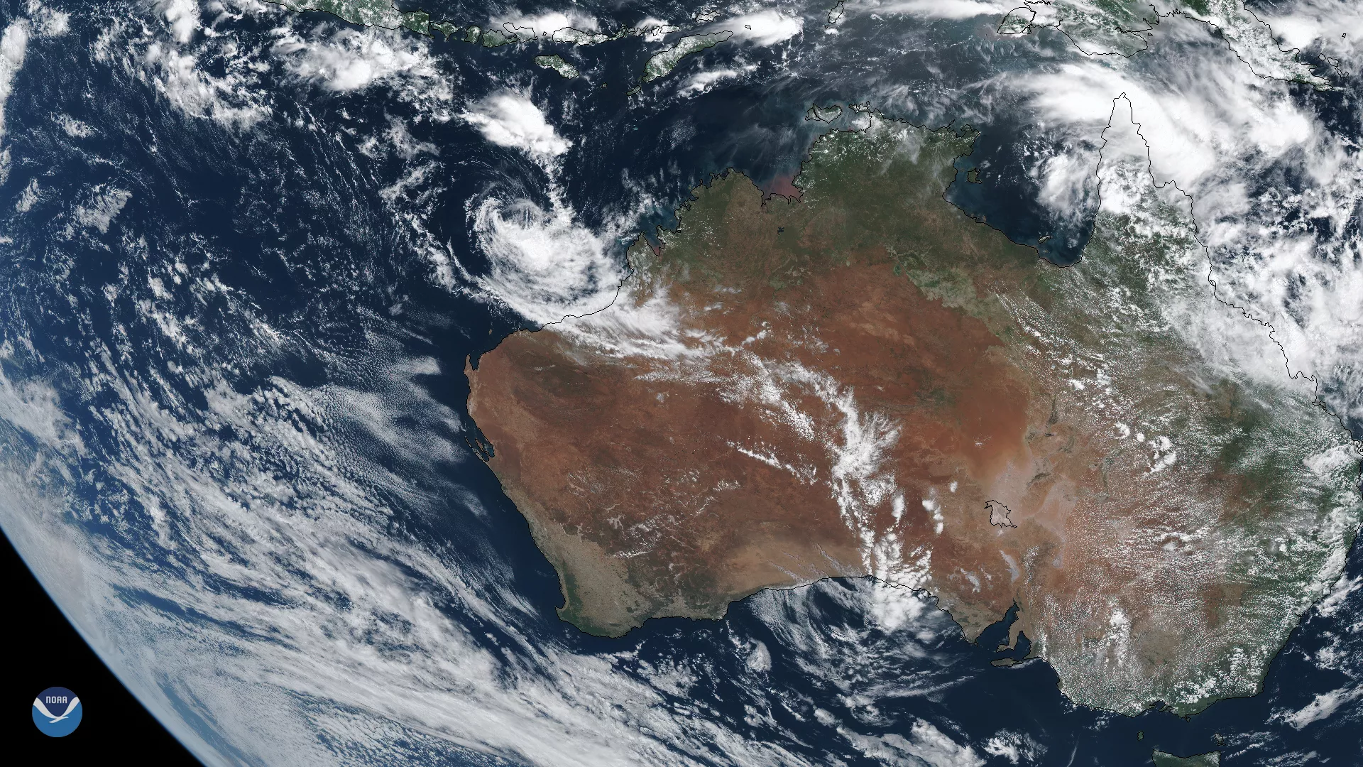 Tropical Cyclone 21S spins off the northwestern coast of Australia.