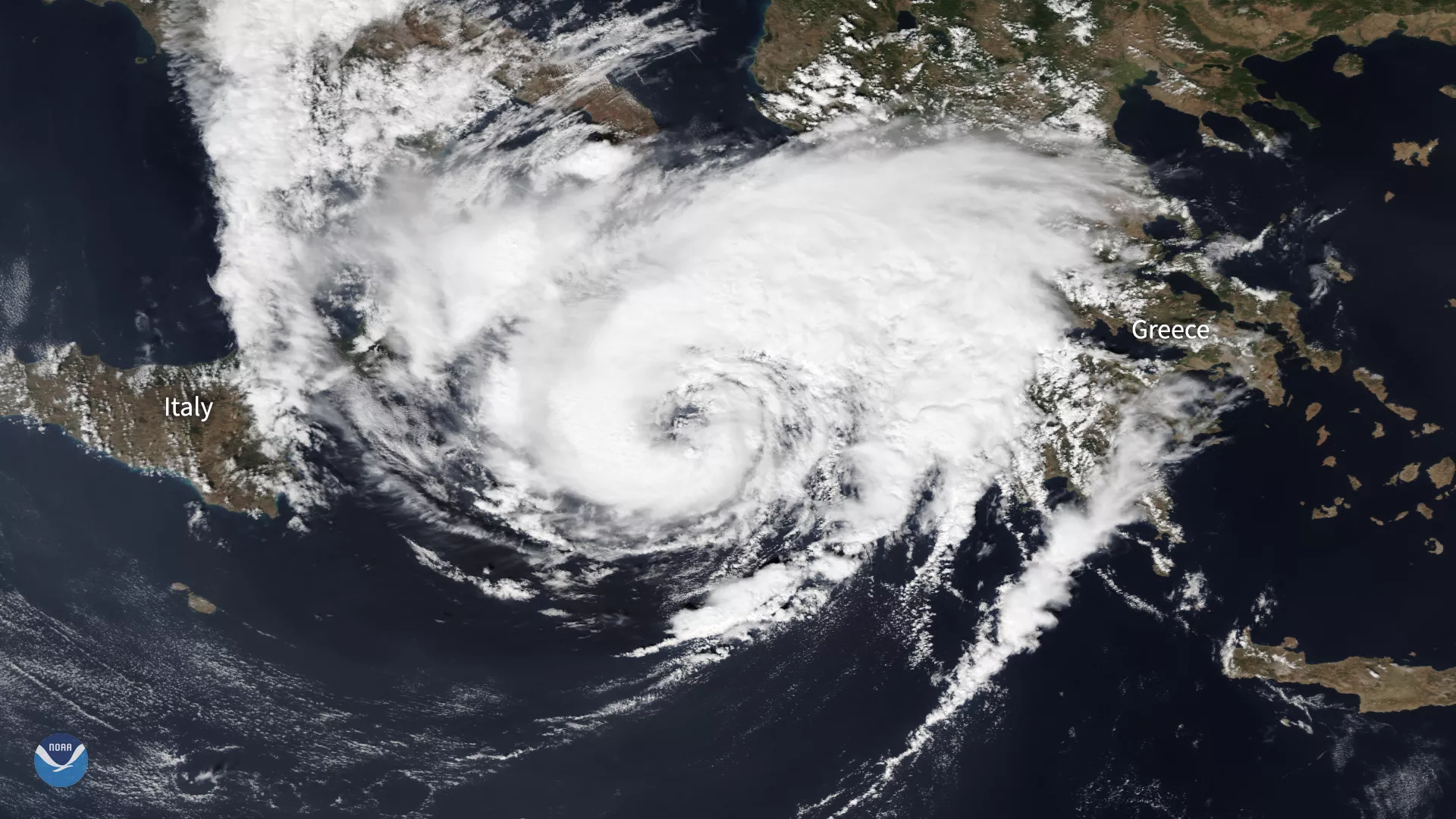 Satellite view of "medicane" storm approaching Greece over the Mediterranean Sea.