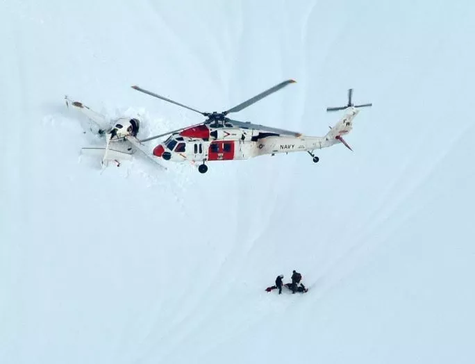 Photo of an airplane rescuing a person