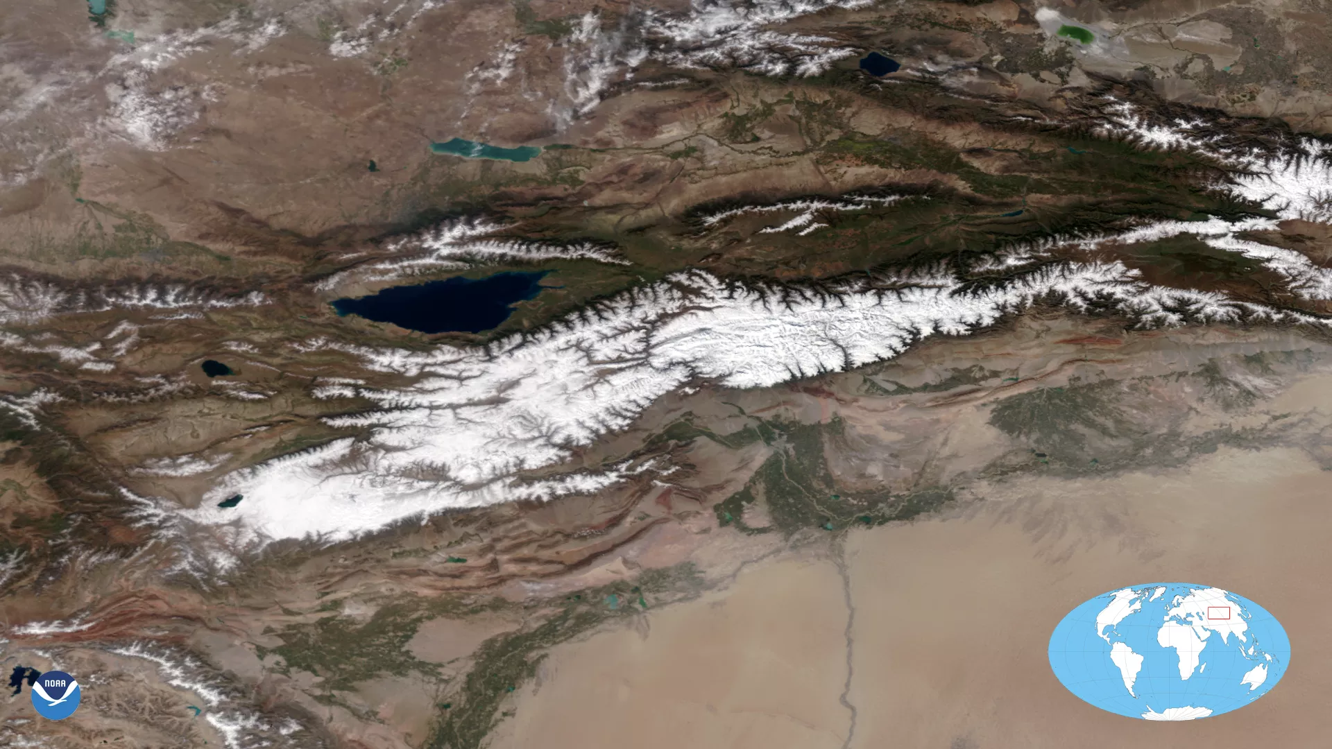 Imagery of the Tian Shan Mountains in China, NOAA-20 satellite, Nov. 2020. An inset shows location on the globe.