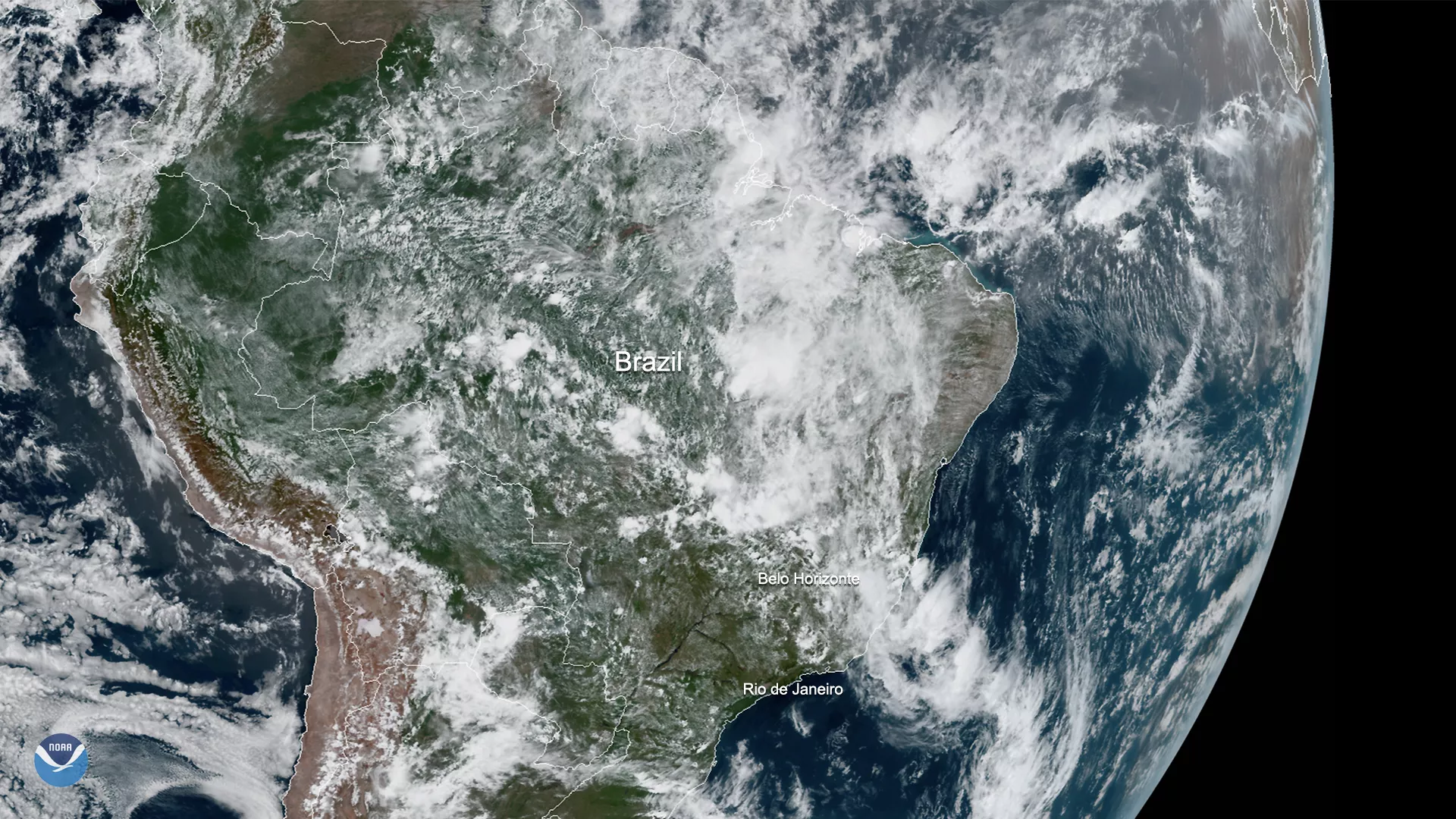 White clouds of large storm system seen over Brazil. 