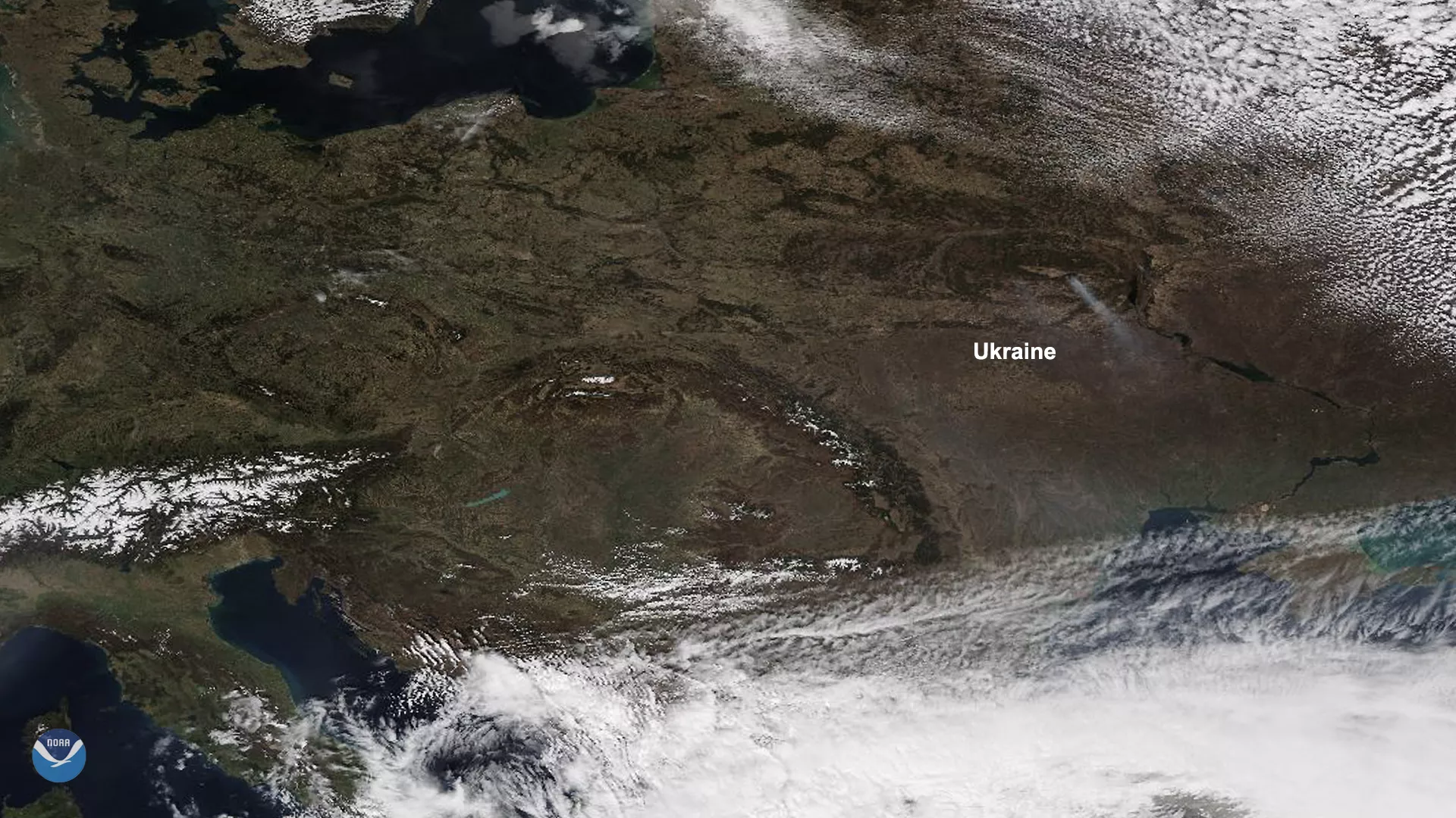Image of Eastern Europe in NOAA-20's TrueColor on April 5, with Ukraine labeled, showing smoke from Chernobyl Exclusion Zone fires.. 
