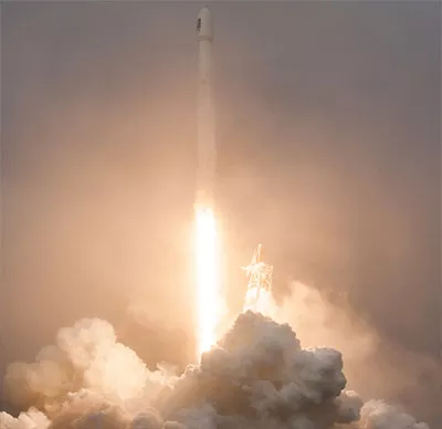 Falcon 9 rocket moments after liftoff, carrying Jason-3 into space