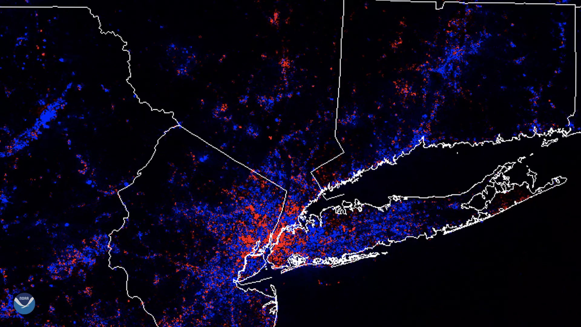 An image of New York City and the surrounding areas. Areas of lights dimming are in blue; areas of brightening are in red. There is quite a bit of dimming throughout the area but some brightening in northern New Jersey and on southern Long Island. 