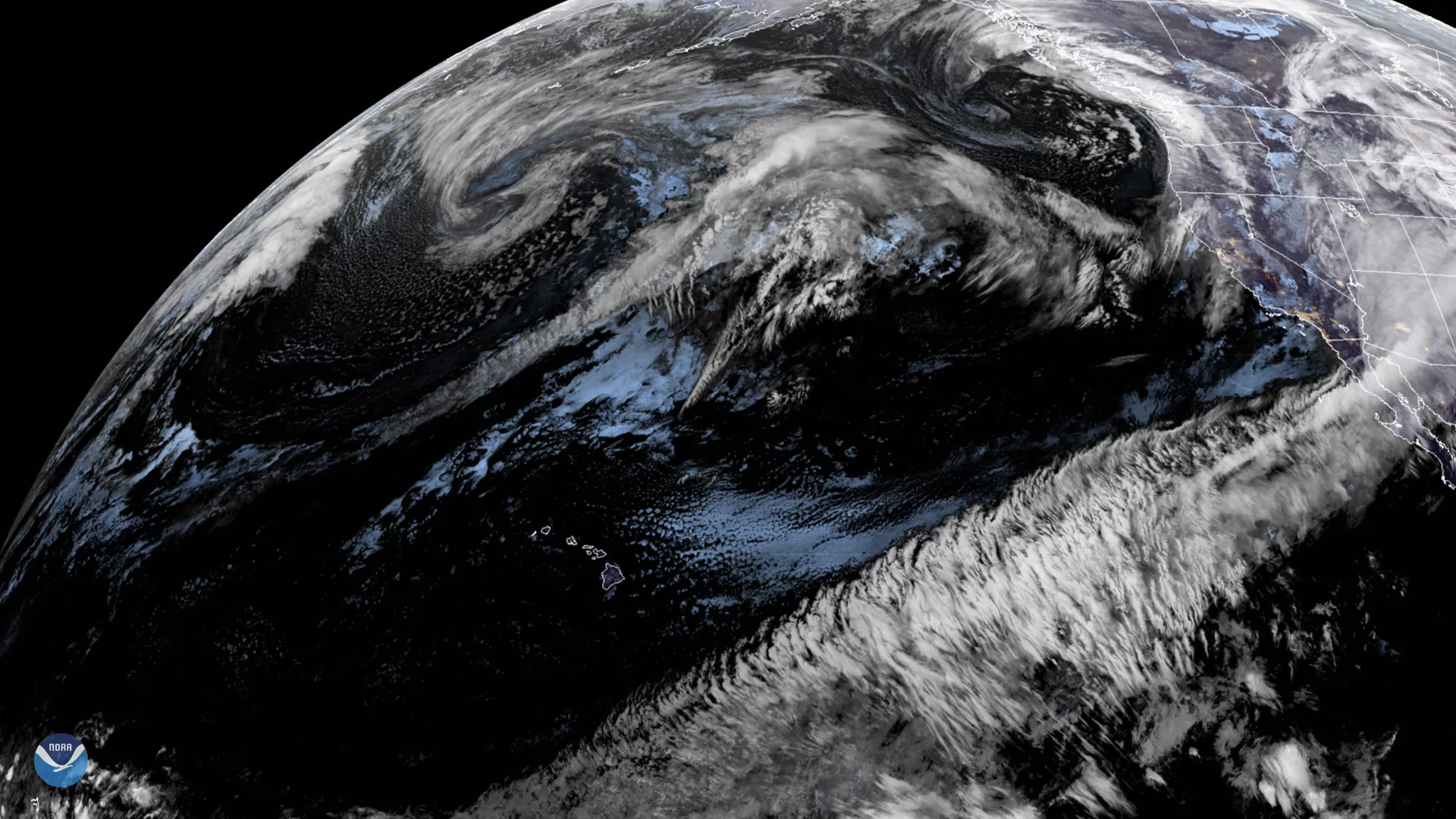 GOES West GeoColor imagery of an atmospheric river flowing across the Pacific in Jan. 2020. 